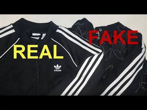 fake adidas jacket with|adidas real or fake.